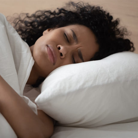 unhappy woman sleeping on a pillow